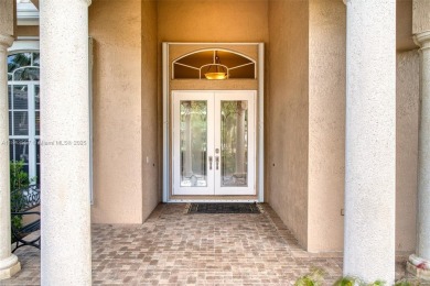SPECTACULAR WATER VIEWS FROM 5 BED, 4 FULL BATH, POOL WITH on Heron Bay Golf Club in Florida - for sale on GolfHomes.com, golf home, golf lot
