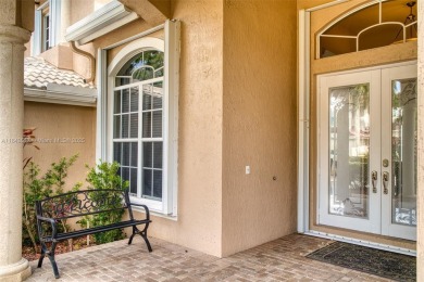 SPECTACULAR WATER VIEWS FROM 5 BED, 4 FULL BATH, POOL WITH on Heron Bay Golf Club in Florida - for sale on GolfHomes.com, golf home, golf lot