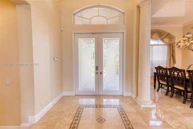 SPECTACULAR WATER VIEWS FROM 5 BED, 4 FULL BATH, POOL WITH on Heron Bay Golf Club in Florida - for sale on GolfHomes.com, golf home, golf lot