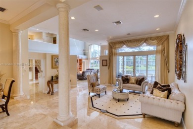 SPECTACULAR WATER VIEWS FROM 5 BED, 4 FULL BATH, POOL WITH on Heron Bay Golf Club in Florida - for sale on GolfHomes.com, golf home, golf lot