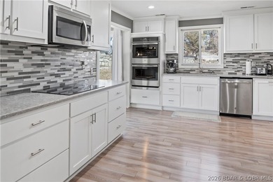 Newer metal roof, gutters & downspouts, newer vinyl siding on Indian Rock Golf Club in Missouri - for sale on GolfHomes.com, golf home, golf lot