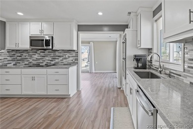 Newer metal roof, gutters & downspouts, newer vinyl siding on Indian Rock Golf Club in Missouri - for sale on GolfHomes.com, golf home, golf lot