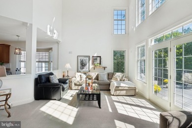Nestled in a serene cul-de-sac in the sought-after gated on Dominion Valley Country Club in Virginia - for sale on GolfHomes.com, golf home, golf lot