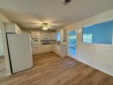 Located just a short golf cart ride to the beach, this on  in Florida - for sale on GolfHomes.com, golf home, golf lot