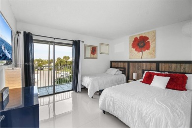 PANORAMIC GOLF COURSE AND LAKE VIEWS from every space in this on Ocean Club At the Hutchinson Island Beach Resort in Florida - for sale on GolfHomes.com, golf home, golf lot