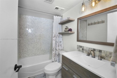 PANORAMIC GOLF COURSE AND LAKE VIEWS from every space in this on Ocean Club At the Hutchinson Island Beach Resort in Florida - for sale on GolfHomes.com, golf home, golf lot