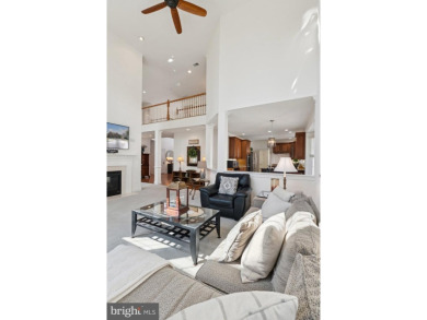 Nestled in a serene cul-de-sac in the sought-after gated on Dominion Valley Country Club in Virginia - for sale on GolfHomes.com, golf home, golf lot