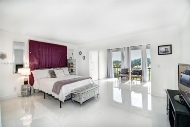 PANORAMIC GOLF COURSE AND LAKE VIEWS from every space in this on Ocean Club At the Hutchinson Island Beach Resort in Florida - for sale on GolfHomes.com, golf home, golf lot