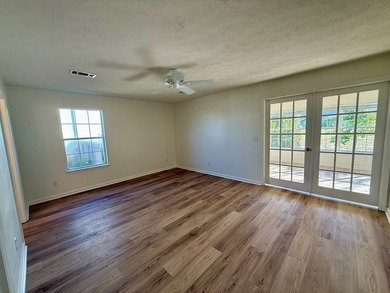 Located just a short golf cart ride to the beach, this on  in Florida - for sale on GolfHomes.com, golf home, golf lot