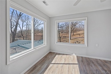 Newer metal roof, gutters & downspouts, newer vinyl siding on Indian Rock Golf Club in Missouri - for sale on GolfHomes.com, golf home, golf lot