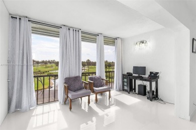 PANORAMIC GOLF COURSE AND LAKE VIEWS from every space in this on Ocean Club At the Hutchinson Island Beach Resort in Florida - for sale on GolfHomes.com, golf home, golf lot