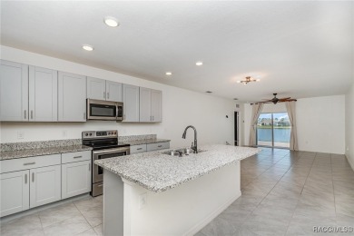 Stunning 3-Bedroom, 2-Bath Home with Breathtaking Lake Views in on Venetian Bay Golf Course in Florida - for sale on GolfHomes.com, golf home, golf lot