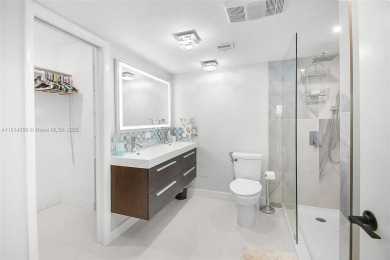 PANORAMIC GOLF COURSE AND LAKE VIEWS from every space in this on Ocean Club At the Hutchinson Island Beach Resort in Florida - for sale on GolfHomes.com, golf home, golf lot