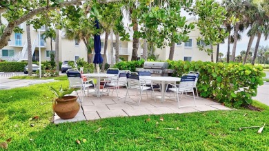 PANORAMIC GOLF COURSE AND LAKE VIEWS from every space in this on Ocean Club At the Hutchinson Island Beach Resort in Florida - for sale on GolfHomes.com, golf home, golf lot