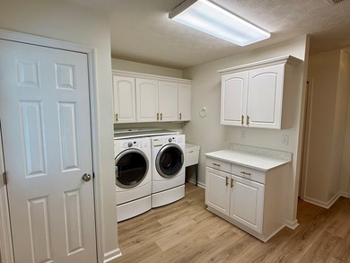 Located just a short golf cart ride to the beach, this on  in Florida - for sale on GolfHomes.com, golf home, golf lot