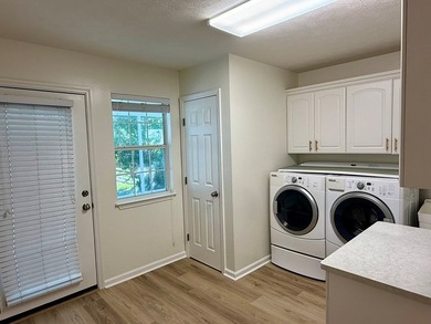 Located just a short golf cart ride to the beach, this on  in Florida - for sale on GolfHomes.com, golf home, golf lot