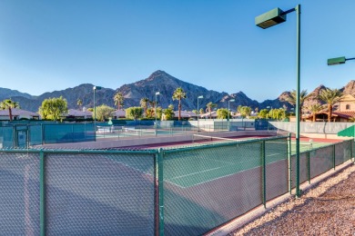 Located in the guard gated lake community of Laguna De La Paz on La Quinta Golf  Resort and Country Clubs in California - for sale on GolfHomes.com, golf home, golf lot