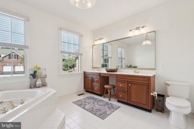 Nestled in a serene cul-de-sac in the sought-after gated on Dominion Valley Country Club in Virginia - for sale on GolfHomes.com, golf home, golf lot