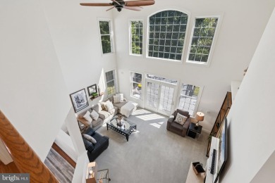 Nestled in a serene cul-de-sac in the sought-after gated on Dominion Valley Country Club in Virginia - for sale on GolfHomes.com, golf home, golf lot