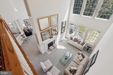 Nestled in a serene cul-de-sac in the sought-after gated on Dominion Valley Country Club in Virginia - for sale on GolfHomes.com, golf home, golf lot
