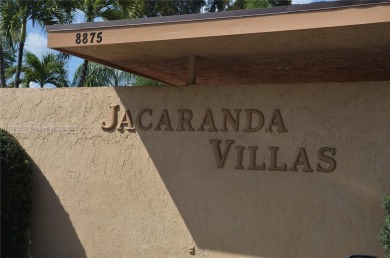 Experience serenity in this stunning 1-bedroom, 1-bathroom on Jacaranda Golf Club in Florida - for sale on GolfHomes.com, golf home, golf lot