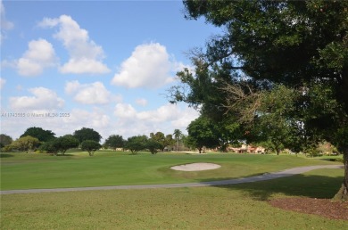 Experience serenity in this stunning 1-bedroom, 1-bathroom on Jacaranda Golf Club in Florida - for sale on GolfHomes.com, golf home, golf lot