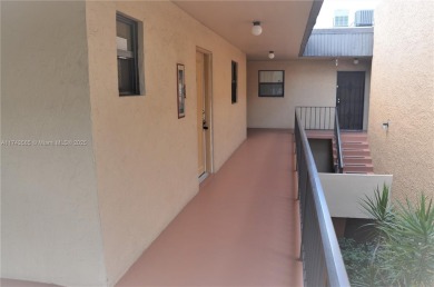 Experience serenity in this stunning 1-bedroom, 1-bathroom on Jacaranda Golf Club in Florida - for sale on GolfHomes.com, golf home, golf lot