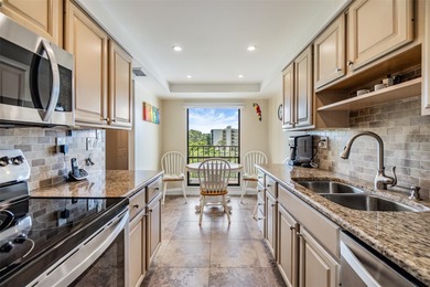 Welcome to this exclusive deluxe two bedroom, two bath corner on Cove Cay Country Club in Florida - for sale on GolfHomes.com, golf home, golf lot