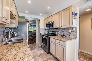 Welcome to this exclusive deluxe two bedroom, two bath corner on Cove Cay Country Club in Florida - for sale on GolfHomes.com, golf home, golf lot