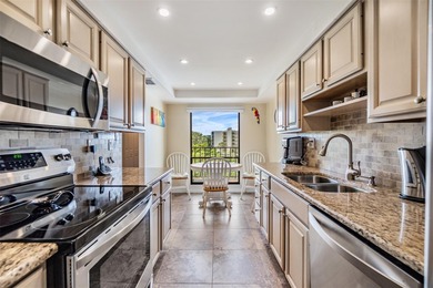 Welcome to this exclusive deluxe two bedroom, two bath corner on Cove Cay Country Club in Florida - for sale on GolfHomes.com, golf home, golf lot