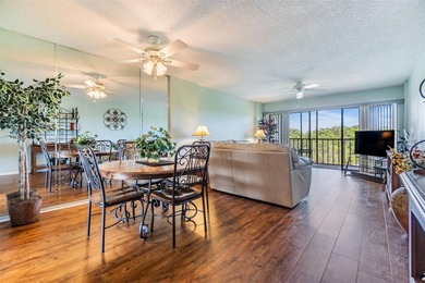 Welcome to this exclusive deluxe two bedroom, two bath corner on Cove Cay Country Club in Florida - for sale on GolfHomes.com, golf home, golf lot