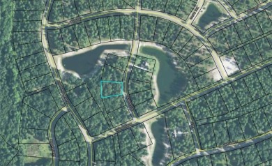 0.62 OF AN ACRE BEHIND THE GATES OF COOPERS POINT AT SHELLMAN on Sapelo Hammock Golf Club in Georgia - for sale on GolfHomes.com, golf home, golf lot