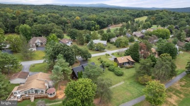 A Masterpiece of Modern Elegance on the Fairway! Experience the on The Woods  Golf and Resort in West Virginia - for sale on GolfHomes.com, golf home, golf lot