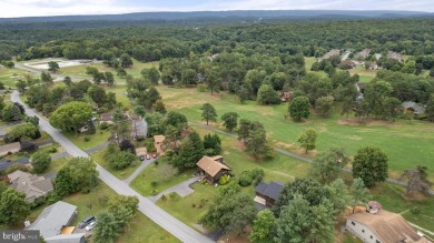 A Masterpiece of Modern Elegance on the Fairway! Experience the on The Woods  Golf and Resort in West Virginia - for sale on GolfHomes.com, golf home, golf lot