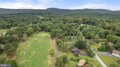 A Masterpiece of Modern Elegance on the Fairway! Experience the on The Woods  Golf and Resort in West Virginia - for sale on GolfHomes.com, golf home, golf lot