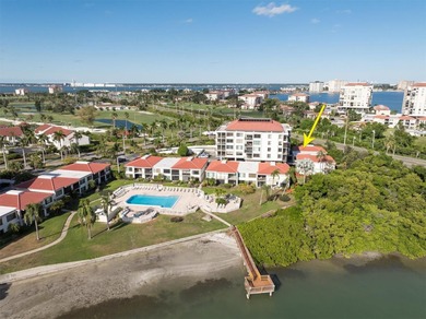 Highly elevated condo in picturesque Isla Del Sol , St on Isla Del Sol Yacht and Country Club in Florida - for sale on GolfHomes.com, golf home, golf lot