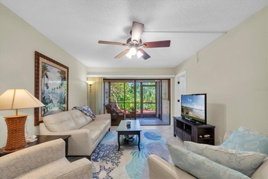 Highly elevated condo in picturesque Isla Del Sol , St on Isla Del Sol Yacht and Country Club in Florida - for sale on GolfHomes.com, golf home, golf lot