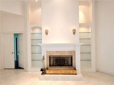 Sunny Oak Harbor Home on 4th fairway w/ an elevated terrace on Oak Harbor Country Club in Florida - for sale on GolfHomes.com, golf home, golf lot