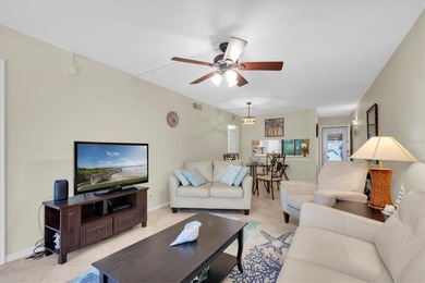 Highly elevated condo in picturesque Isla Del Sol , St on Isla Del Sol Yacht and Country Club in Florida - for sale on GolfHomes.com, golf home, golf lot
