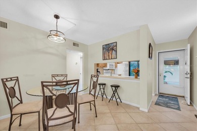 Highly elevated condo in picturesque Isla Del Sol , St on Isla Del Sol Yacht and Country Club in Florida - for sale on GolfHomes.com, golf home, golf lot