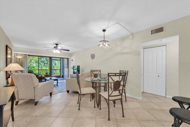 Highly elevated condo in picturesque Isla Del Sol , St on Isla Del Sol Yacht and Country Club in Florida - for sale on GolfHomes.com, golf home, golf lot