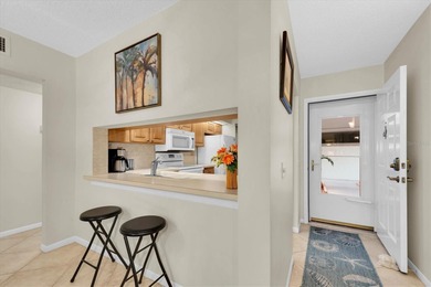 Highly elevated condo in picturesque Isla Del Sol , St on Isla Del Sol Yacht and Country Club in Florida - for sale on GolfHomes.com, golf home, golf lot