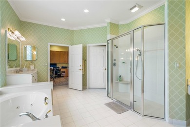 Sunny Oak Harbor Home on 4th fairway w/ an elevated terrace on Oak Harbor Country Club in Florida - for sale on GolfHomes.com, golf home, golf lot