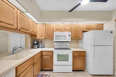 Highly elevated condo in picturesque Isla Del Sol , St on Isla Del Sol Yacht and Country Club in Florida - for sale on GolfHomes.com, golf home, golf lot