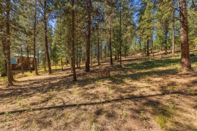 This beautifully treed 0.89-acre parcel offers a gentle uphill on Meadowcreek Golf Resort in Idaho - for sale on GolfHomes.com, golf home, golf lot