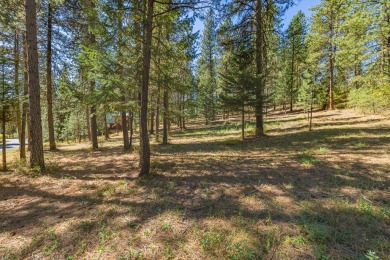 This beautifully treed 0.89-acre parcel offers a gentle uphill on Meadowcreek Golf Resort in Idaho - for sale on GolfHomes.com, golf home, golf lot