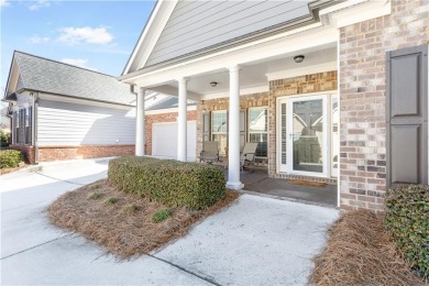 Stunning beauty surrounds this graceful home nestled in sought on Brookstone Golf and Country Club in Georgia - for sale on GolfHomes.com, golf home, golf lot