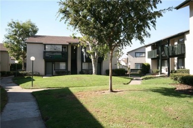 Nestled in the desirable Aliso Creek Villas community in Lake on Lake Forest Golf and Practice Center in California - for sale on GolfHomes.com, golf home, golf lot