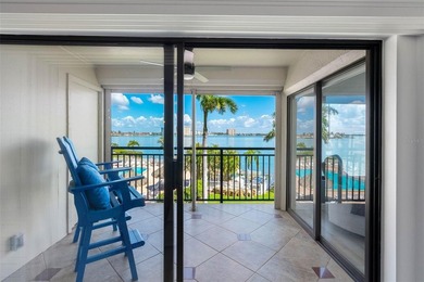 Premium WATERFRONT CORNER CONDO WITH PANORAMIC WATER VIEWS ON on Isla Del Sol Yacht and Country Club in Florida - for sale on GolfHomes.com, golf home, golf lot