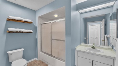 Enjoy peaceful golf course and water views from this 2-bedroom on Imperial Lakes Country Club in Florida - for sale on GolfHomes.com, golf home, golf lot